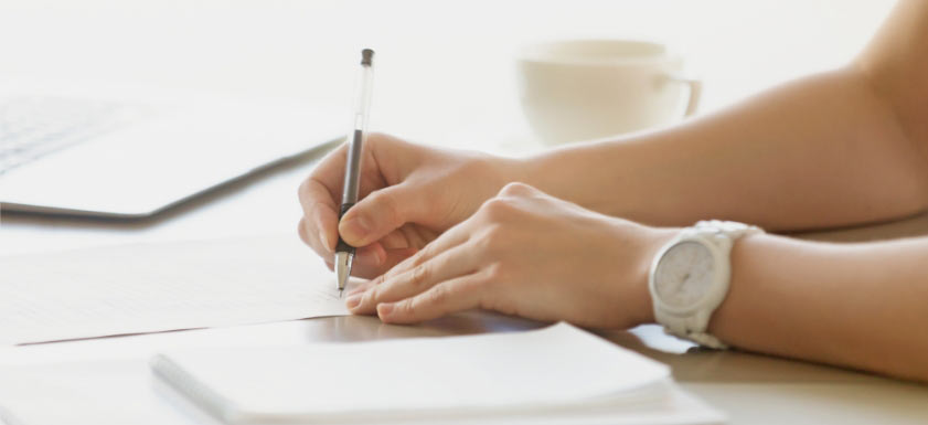 woman filling out forms